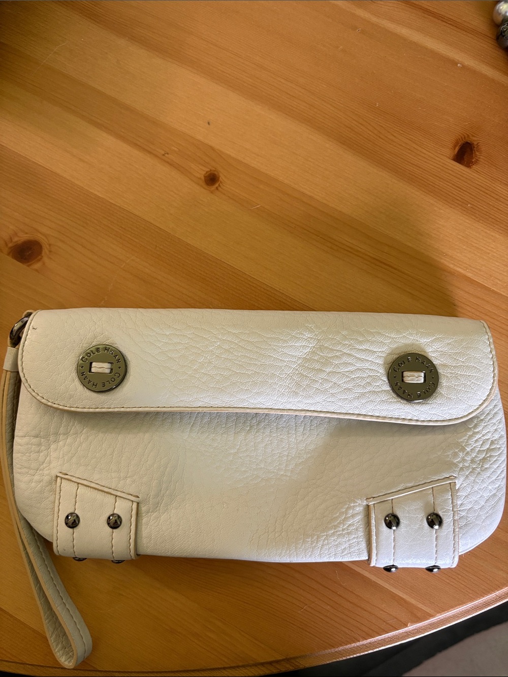 Cole Haan Cream Leather Wristlet Clutch with Metal Accents
